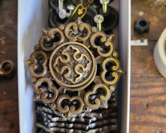Brass cabinet pulls and plates