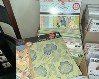 A CASE FULL OF SCRAPBOOKING PAPER - MOSTLY NEW!
