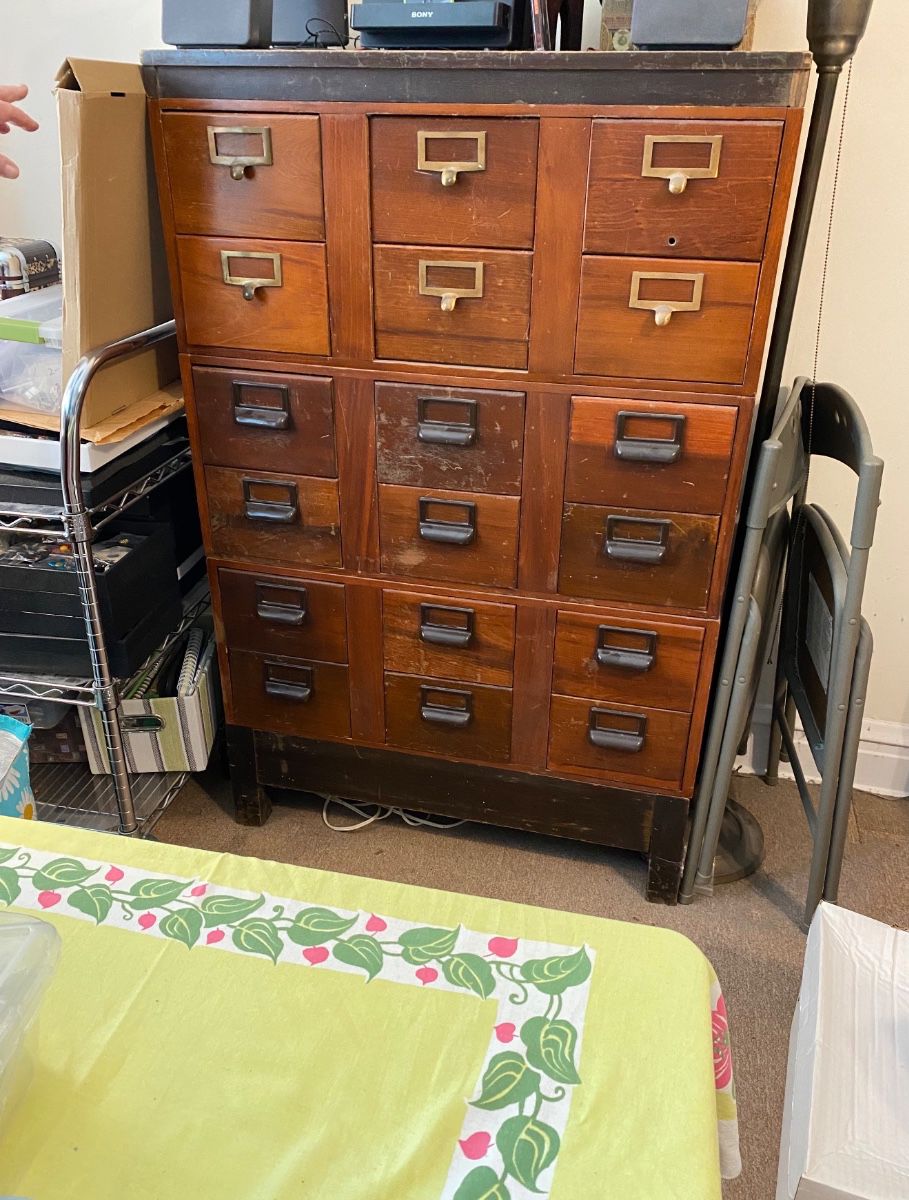 Antique Legal File...five piece stacking with top and base with three sections, two with bakelite handles, one with brass.  Size is perfect for DVDs