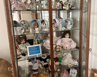 Curio Cabinet, collectible plates and dolls