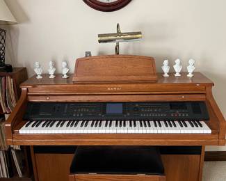 Kawai Digital Piano, wall clock, composer busts - upstairs 