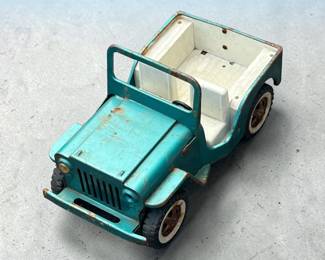 1960s Tonka Jeep Dispatcher made of pressed steel, typically featuring a turquoise or blue body with a white interior $65.00