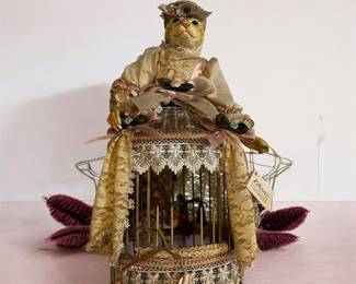 Katherine's Collection" cat and birdcage decor designed by Wayne Kleski $225.00