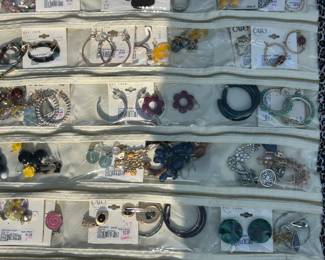 Tons of costume jewelry; ear rings, necklaces and more!