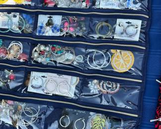 Tons of costume jewelry; ear rings, necklaces and more!