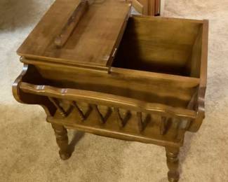 Vintage Mid-Century Colonial Revival Wooden Sewing Cabinet / Magazine Rack End Table: Turned spindle legs, front slotted magazine or book rack, and a hinged split-top lid opening to a deep storage compartment (traditionally used for sewing supplies, yarn, or living room storage).