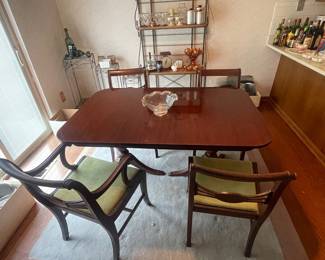 Mahogany Table with one leaf, 4 chairs and table pads