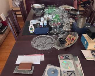 Assorted Glassware, SilverPlated Serving Pieces, and Collectibles