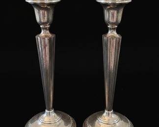 Pair of Weighted Sterling Silver Candlesticks