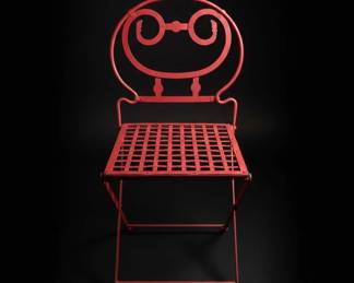 Vintage Red Metal Folding Chair with Decorative Scrollwork