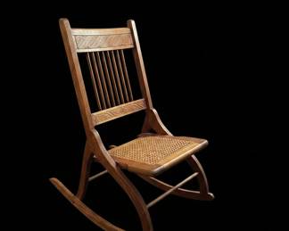 Victorian Era Folding Rocking Chair with Carved Details and Cane Seat second image