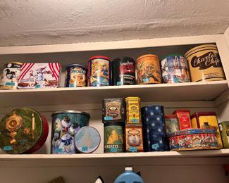 Vintage and decorative tins including Charles Chips and Hershey