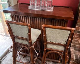 Vintage Mid-Century Tropical Bamboo Tiki Bar unit paired with two matching upholstered bamboo barstools. 3-piece set..