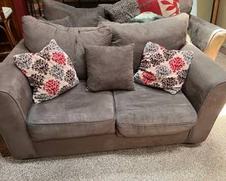 Loveseat with pillows. Matching three-seat couch also available.