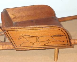 WOOD WHEELBARROW CARVED HORSE