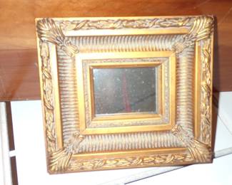 SMALL ORNATE MIRROR