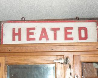 HEATED CARVED WOOD SIGN