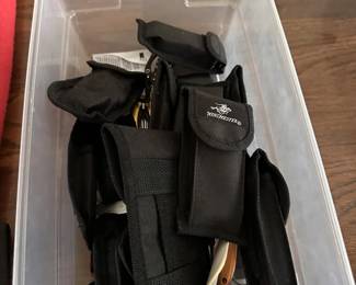 Assorted knives and multitools.