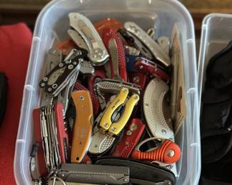 Assorted pocket knives and multi tools