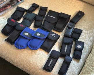 Assorted multi-tools with cases