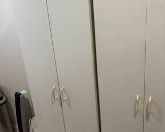 Two White Storage Cabinets