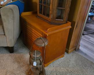 Cabinets and hard wired vintage oil lamp