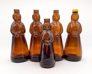 Lot 707: 5 Mrs. Butterworth's Amber Glass Figural Syrup Bottles