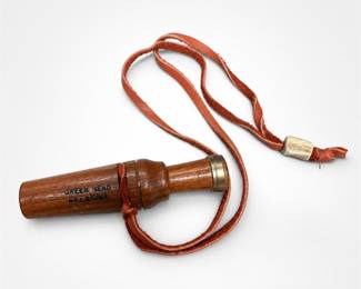 Lot 537: Green Head Wooden Deer Call with Leather Lanyard