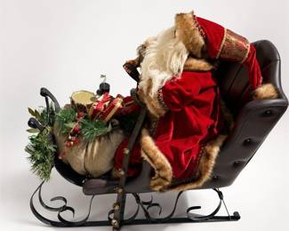 Lot 636: Large Santa in Sleigh Figure with Toy Sack and Bells
