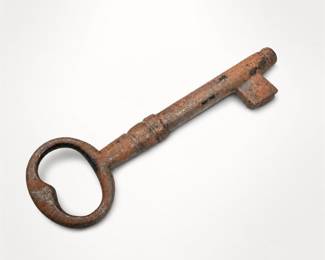 Lot 391: Large Iron Skeleton Key with Heart-Cutout Bow