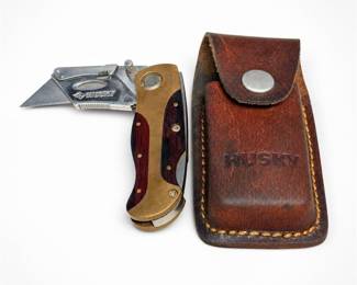 Lot 545: Husky Folding Utility Knife with Leather Sheath
