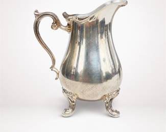 Lot 508: Silverplate Footed Cream Pitcher with Scroll Handle