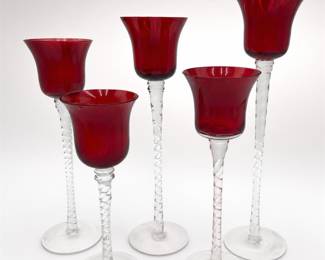 Lot 710: Set of 5 Ruby Red Glass Long-Stem Candle Holders