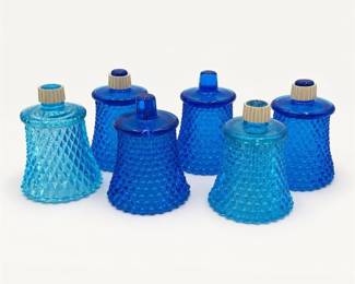 Lot 582: 6 Blue Glass Hobnail & Diamond-Point Peg Votive Cups