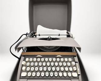 Lot 624: Sears Portable Electric Typewriter with Hard Case