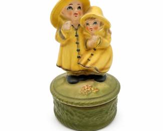 Lot 0904: Bisque Figural Trinket Box, Children in Rain Slickers