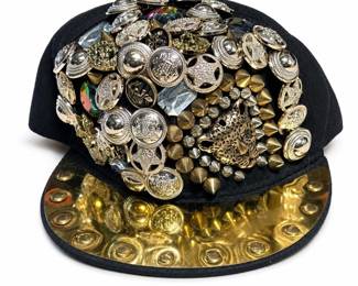 Lot 833: Studded and Jeweled Snapback Cap with Gold Brim Plate