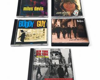 Lot 1021: 5 Music CDs: The Beatles, Miles Davis, Buddy Guy & More