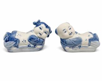 Lot 825A: Pair of Chinese Blue & White Porcelain Reclining Children