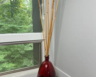 Red Glass Vase with Bamboo Stalks