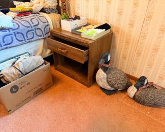 Bed, nightstand, Canadian geese