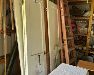 ladders, interior doors, hand tools, shop equipment, hardware, gardening supplies, storage bins, and a variety of home improvement materials