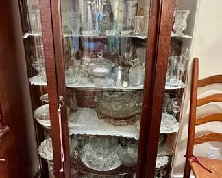 Curved Glass Curio Cabinet with Lion Head Carvings