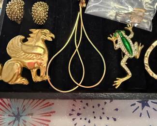 gold plated griffin brooch , frog brooch