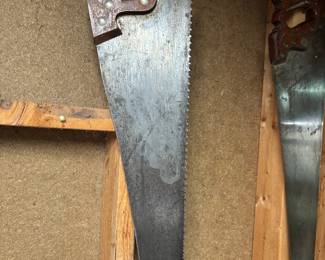 This is a vintage Disston & Sons D-8 hand saw manufactured in Philadelphia