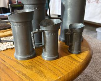 Dutch pewter measuring cups. A complete set (priced individually though)