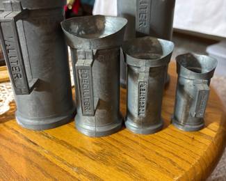 Dutch pewter measuring cups. A complete set (priced individually though)