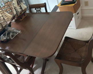 Lot 113: Wooden Dining Table and Four Chairs