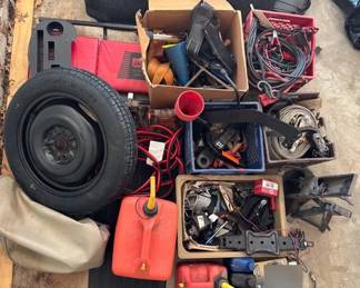 Large Lot of Car Items Including Spare Tire, Jacks, Gas Cans, Ratchet Straps and More