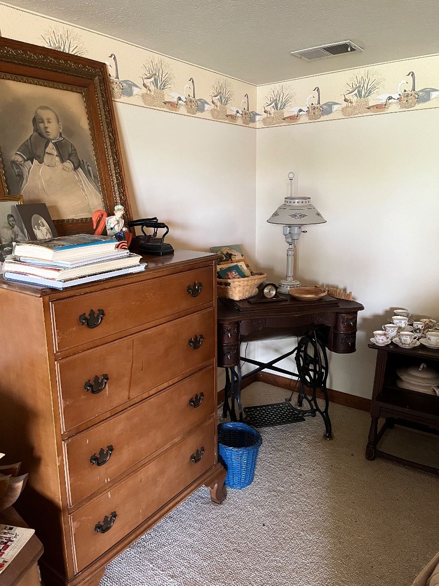 antique sewing machine, dresser, chamber pot with cabinet, tea sets, pic frames